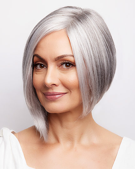 Middle aged woman with long grey bob wig